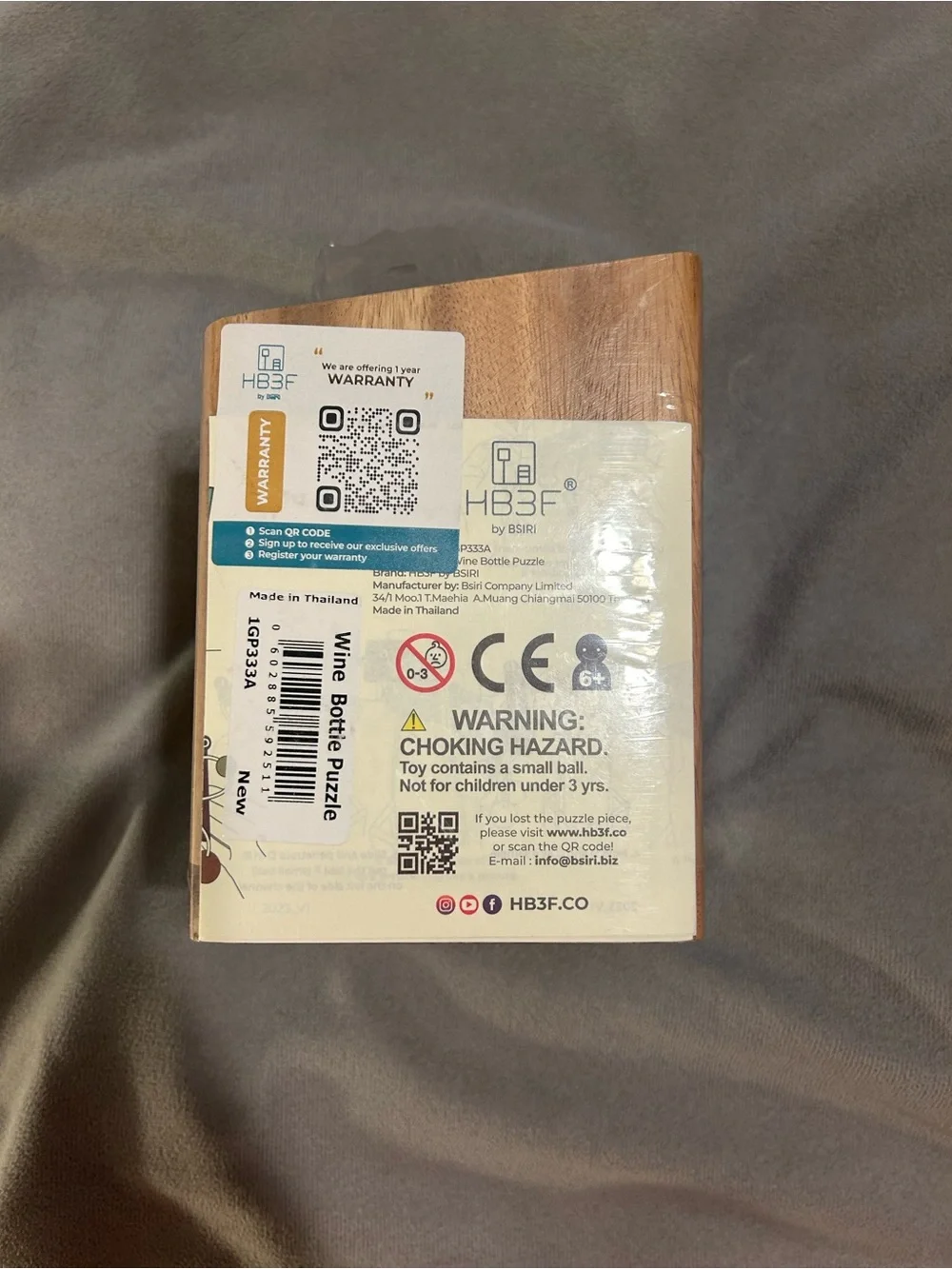 Wooden Bottle Puzzle Holder in Brown